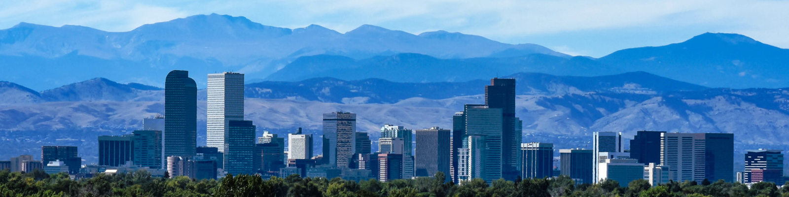 Denver skyline with the Front Range — Novo Legal represents immigrant workers across Denver and Colorado.